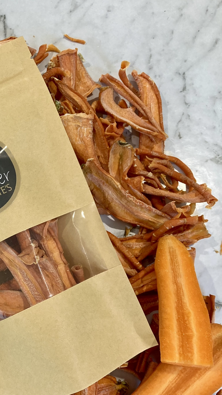 Pocket pet treat carrot slices. Natural, dehydrated pet treats by Farmer Pete&#39;s. 
