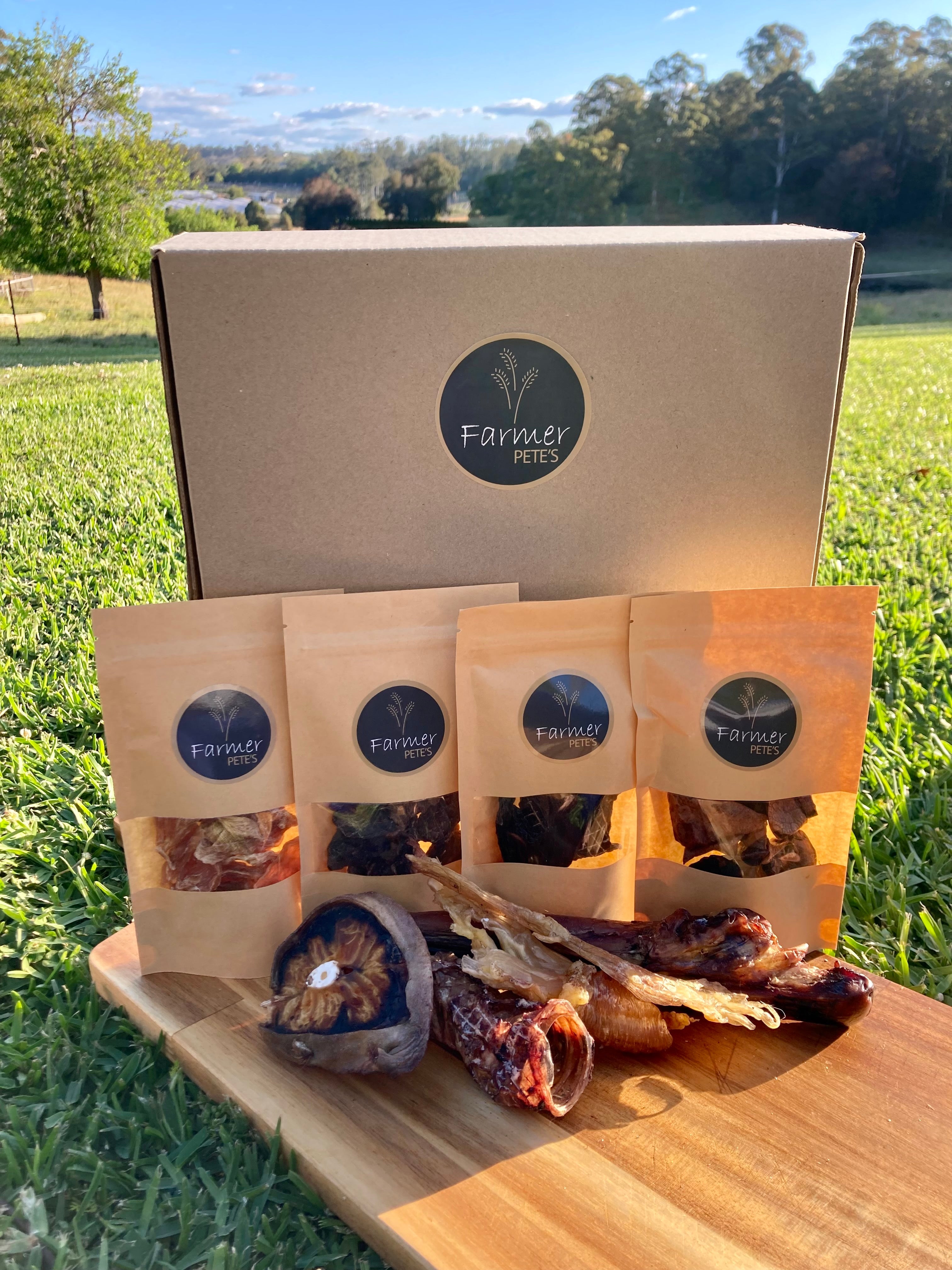 Sample box of dog treats, great for gifts, by Farmer Pete's