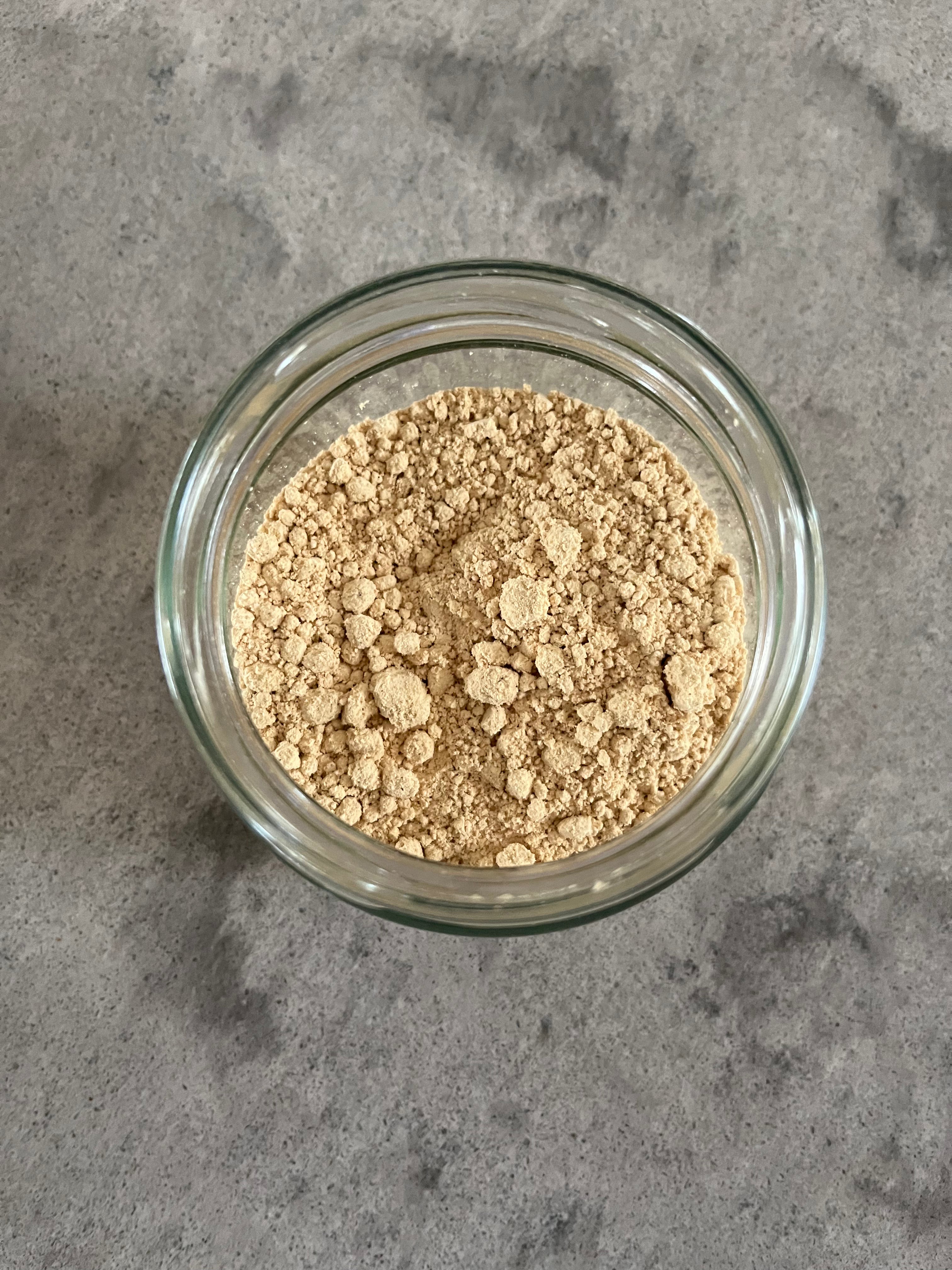 Happy Heart Peanut Butter Dog Treat in powdered form, by Farmer Pete&#39;s pet products.