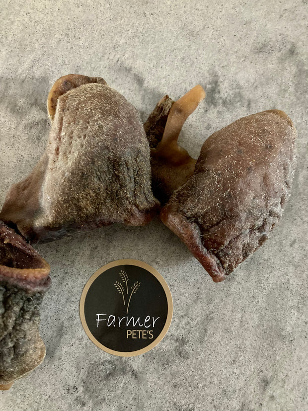 Natural dehydrated Beef Chin chews for dogs by Farmer Pete's. 
