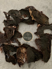 Beef Heart dog treats arranged in a circle. Natural dog treats by Farmer Pete's.