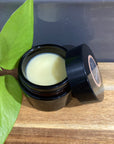 Natural dog paw balm for cracked and sore paws and noses. By Farmer Pete's