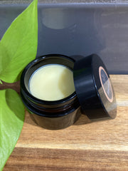 Natural dog paw balm for cracked and sore paws and noses. By Farmer Pete's
