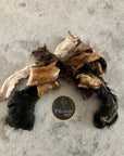 Collection of small beef skin chews by Farmer Pete's. Healthy dog chew alternative. 
