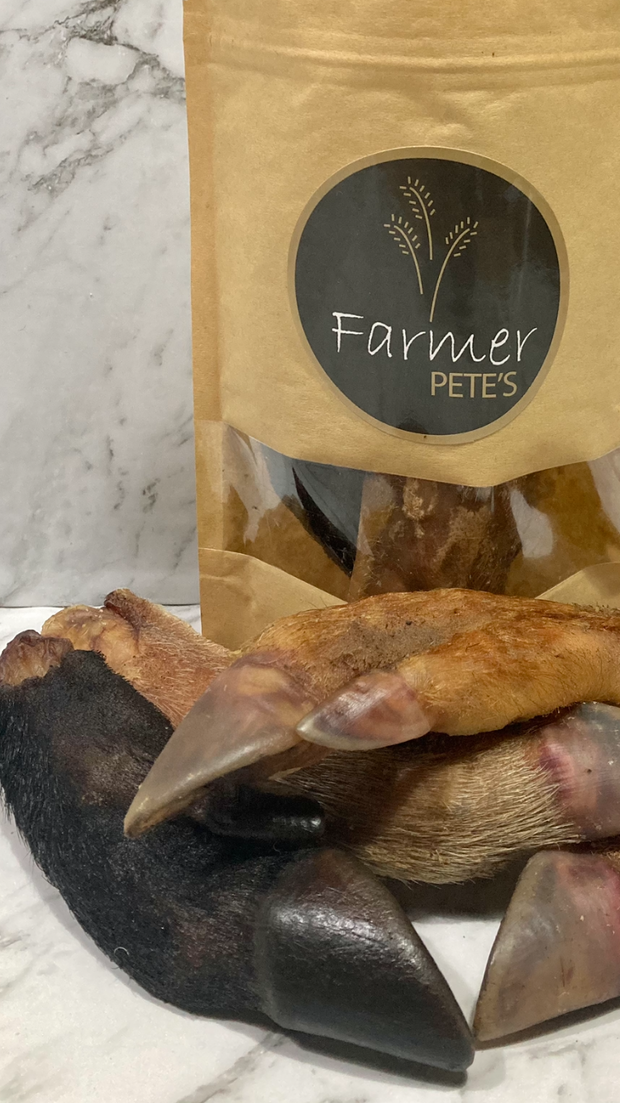 Pork trotter halves with hair on dog chews. Australian made by Farmer Pete's.