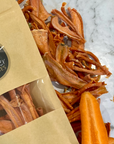 Pocket pet treat carrot slices. Natural, dehydrated pet treats by Farmer Pete's. 