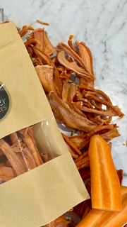 Pocket pet treat carrot slices. Natural, dehydrated pet treats by Farmer Pete's. 