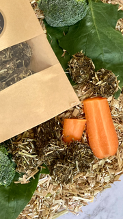 Farmer Pete's Tuesday Tantaliser biscuits made from fresh Australian carrot, spinach, rocket, coriandar and oaten hay. 