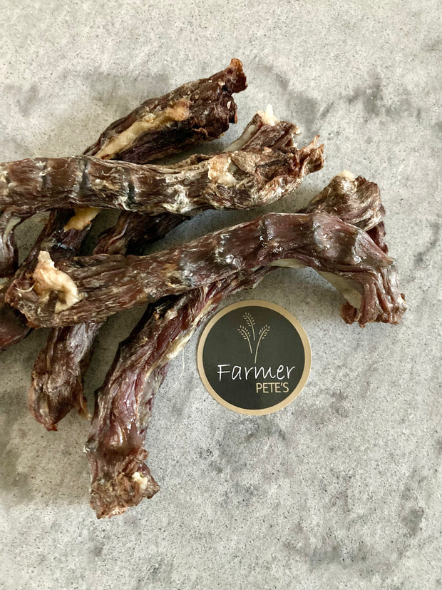 Novelty dog chew, duck necks by Farmer Pete's.