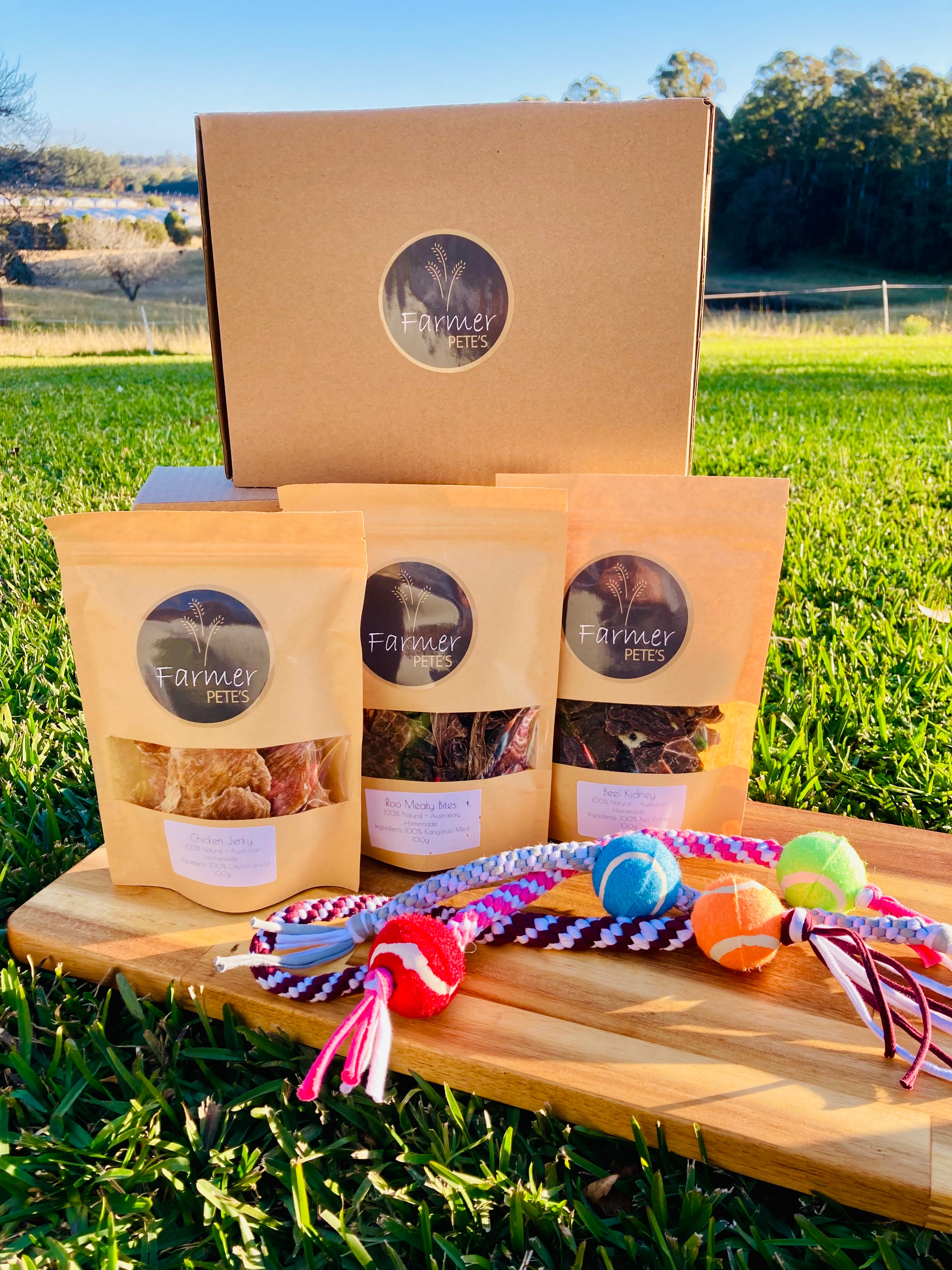 Perfect gift for pooches Australia wide, Farmer Pete&#39;s small gift box with small toy and treats. 