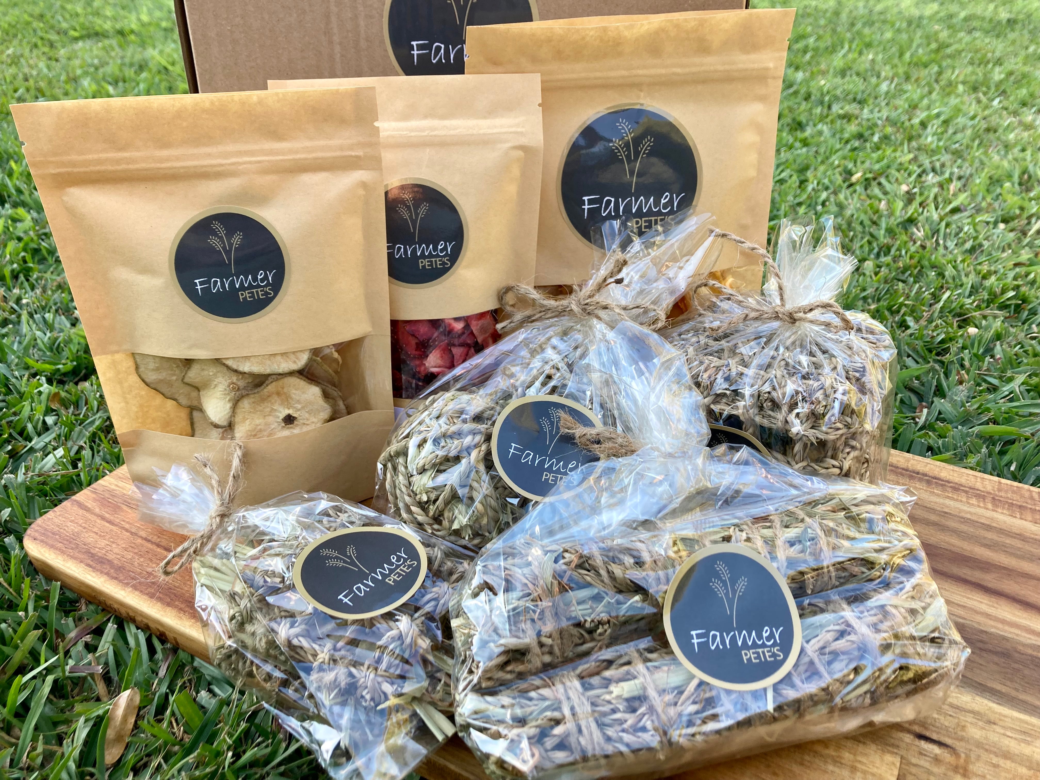 Farmer Pete's Rabbit and Guinea Pig gift box with treats and toys. 